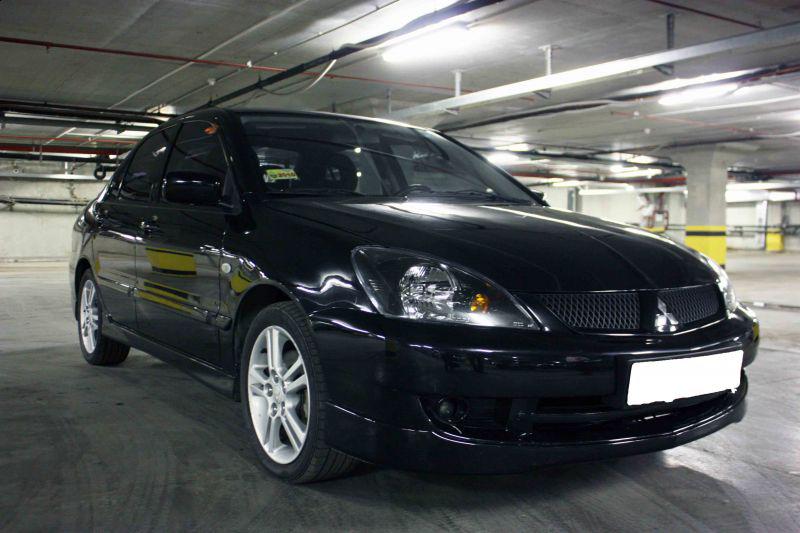 Фото mitsubishi lancer 2006 год черный цвет